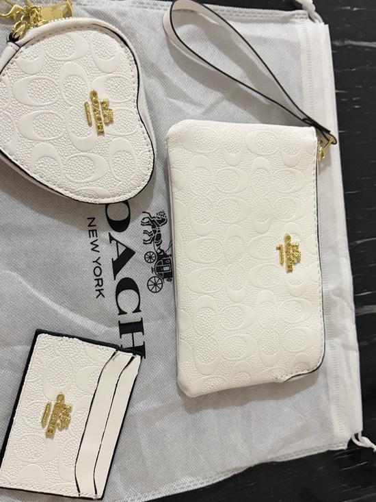 Coach Handbags - Coach White Signature Embossed Wristlet and Card Case Set